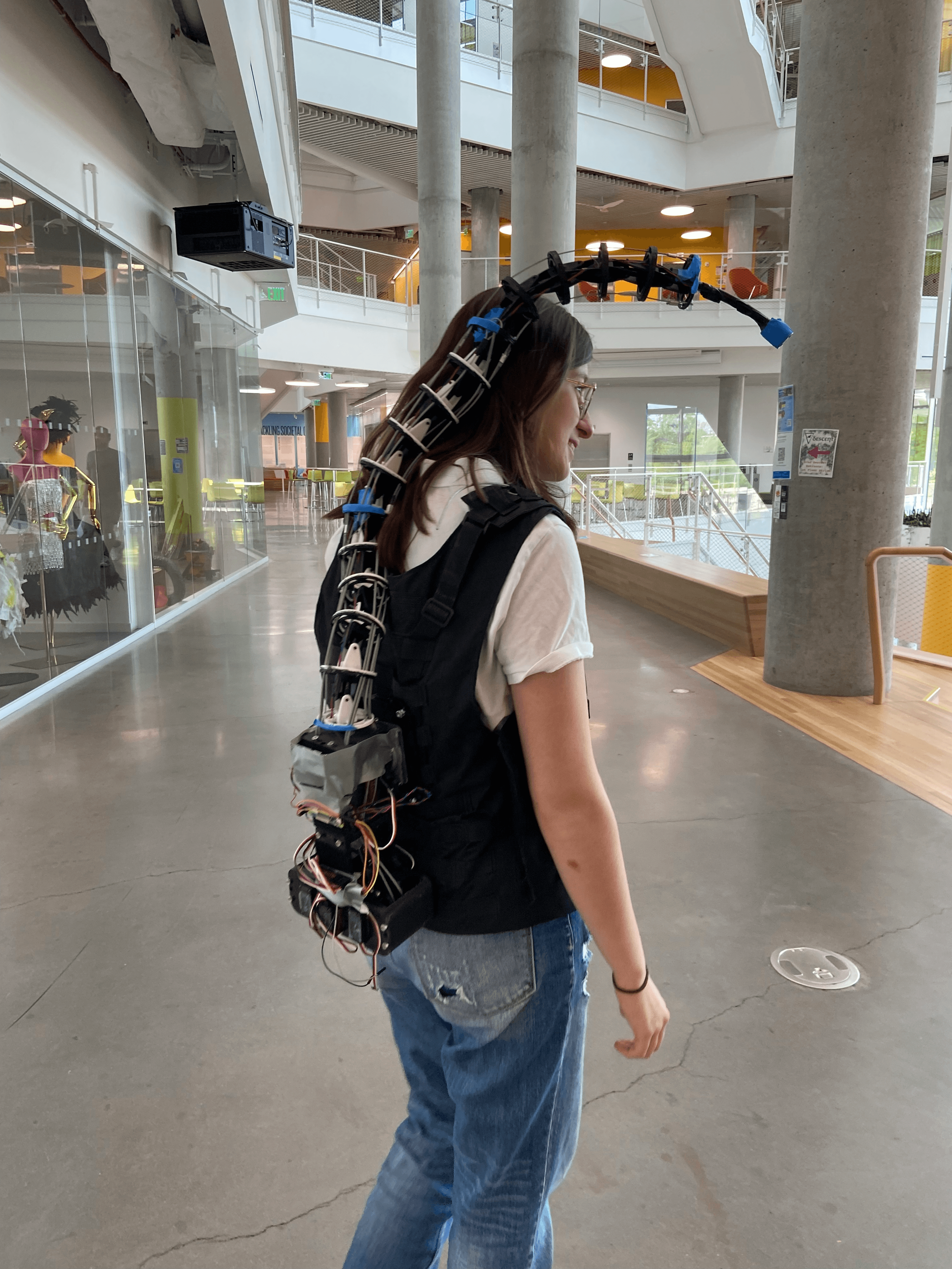 An AR-controlled ML-controlled extra robotic limb